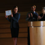 A lady received an award on a job well done